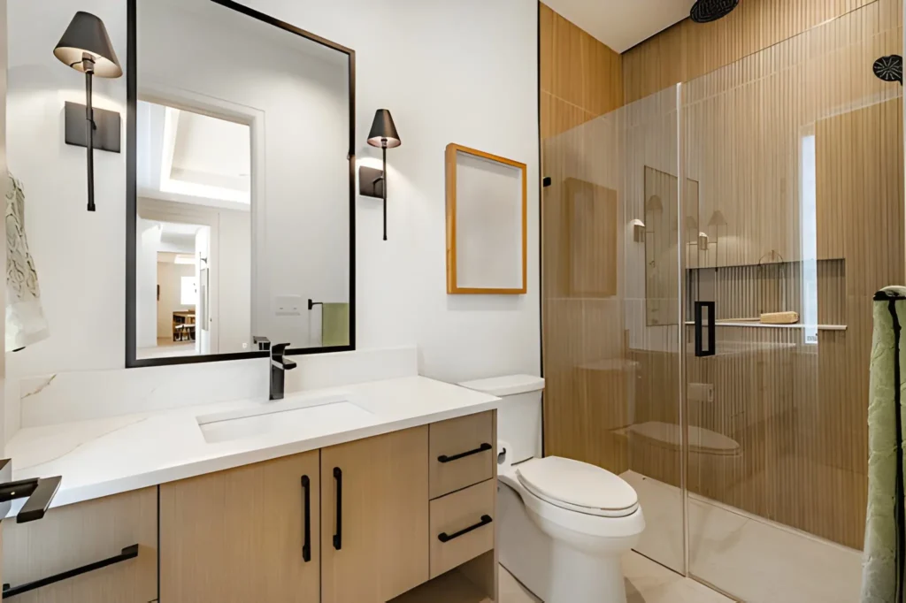 Spa-inspired bathroom renovation with walk-in shower and double vanity completed through Home Remodeling in West University Place